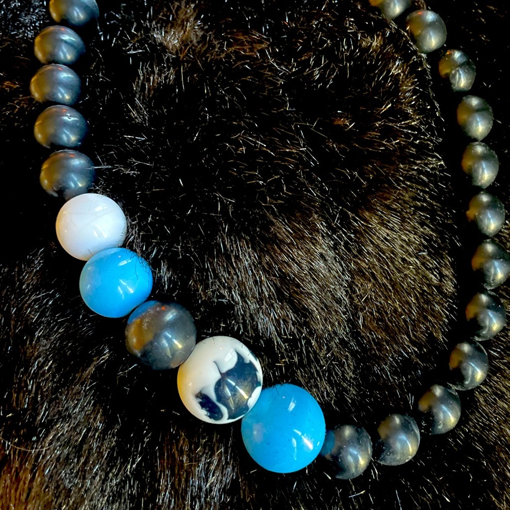 Black blue and white beaded necklace